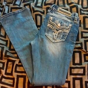 Rock Revival Blue Boot Cut Jeans with Signature Embellishments
